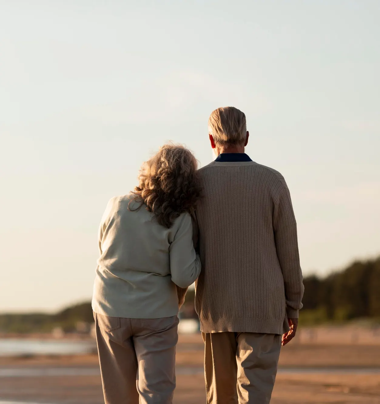 old age couple at beach